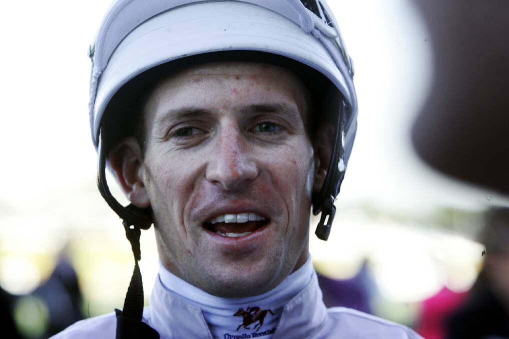 SUCCESS: A young Hugh Bowman is all smiles after riding a winner at Rosehill in 2006. Photo: JENNY EVANS