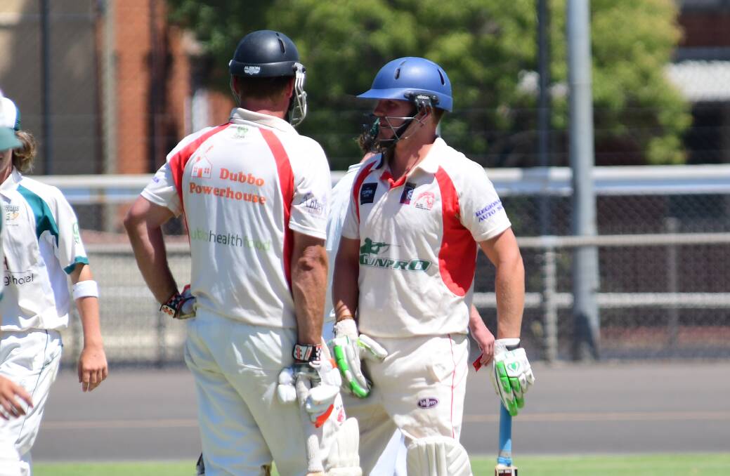 DOING A JOB: RSL-Colts captain Greg Buckley (right) only made 23 on Saturday as Brad Cox (left) stole the show. Photo: BELINDA SOOLE