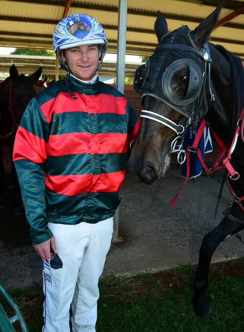 TEAM SHANNON: Mat Rue, pictured with Peter Bullock's Blackmagic Shannon at Dubbo earlier this year, will drive two of the trainer's other horses at Parkes on Sunday afternoon. Photo: BROOK KELLEHEAR-SMITH