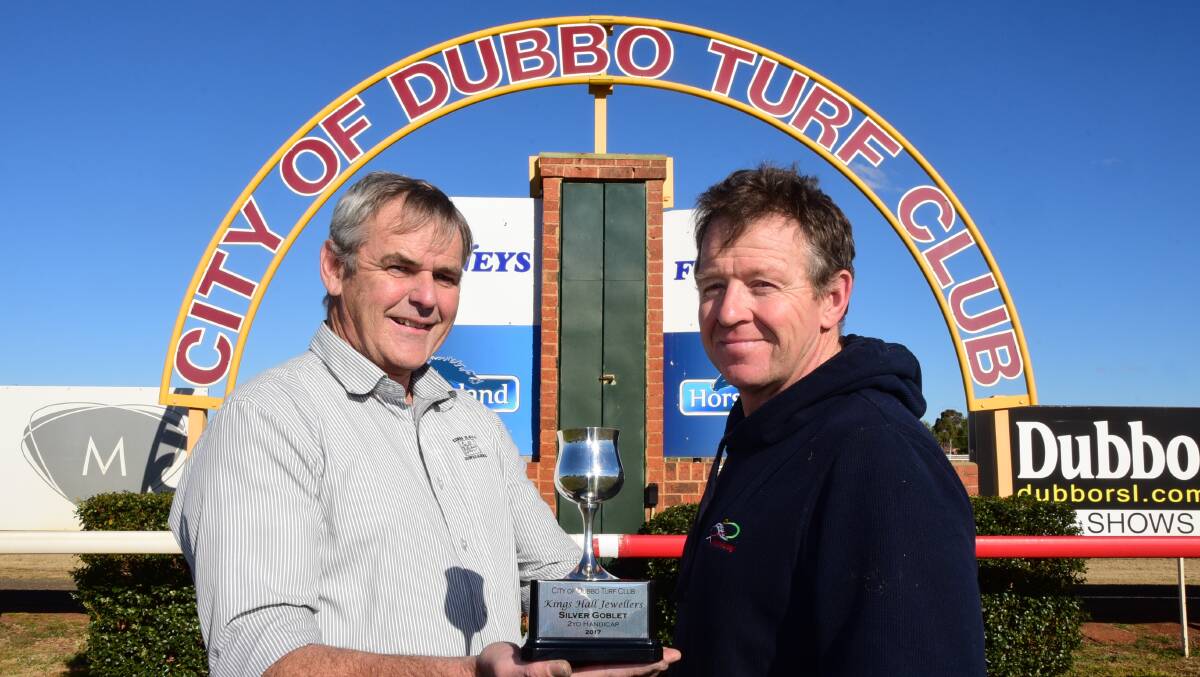GOBLET GLORY: Kings Hall Jewellers' Craig Carolan and Dubbo Turf Club's Vince Gordon with the Silver Goblet. Photo: BELINDA SOOLE