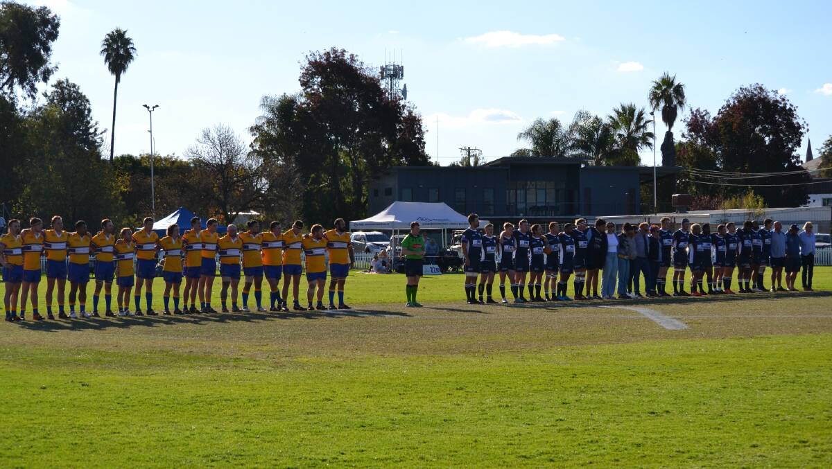 Members of the Lavaka family alongside the Forbes Platypi and Bathurst Bulldogs prior to last weekend's Blowes Cup match at Grinstead Oval. Picture by Forbes Rugby Union Club/Facebook