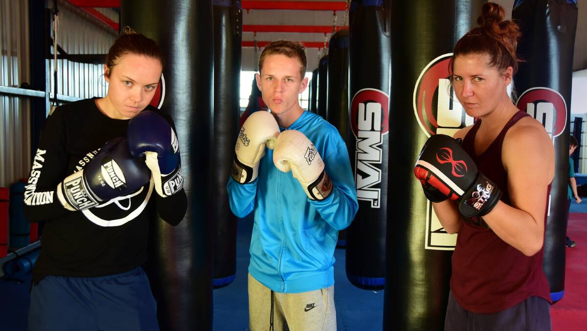 READY: Enja Prest, John Hill and Ayla Barker at training before departing for Saturday's fight night at Auckland. Photo: BELINDA SOOLE