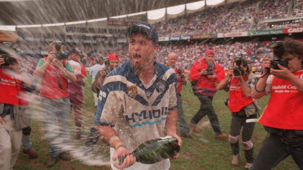 GLORY: The 1995 premiership with the Bulldogs was the highlight of Dean Pay's club career. Photo: TIM CLAYTON