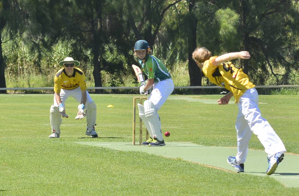 DOING HIS BIT: Zac Williams made a handy 28 not out and combined well with his father Ben (80 not out) in CYMS Green's seven-wicket RSL-Kelly Cup victory over Macquarie Blue on Saturday. Photo: PAIGE WILLIAMS