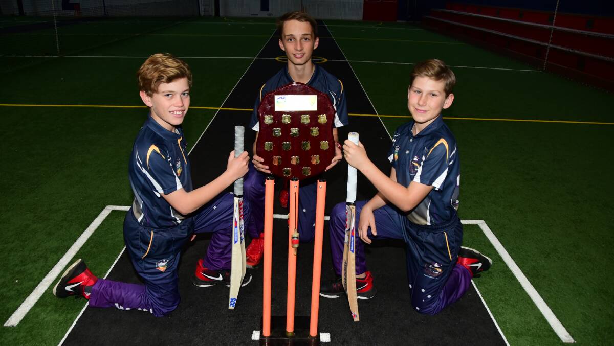 THE CHAMPIONS: Paddy Nelson (left), Tom Coady (centre) and Anthony Atlee with the under 13s national indoor shield. Photo: BELINDA SOOLE