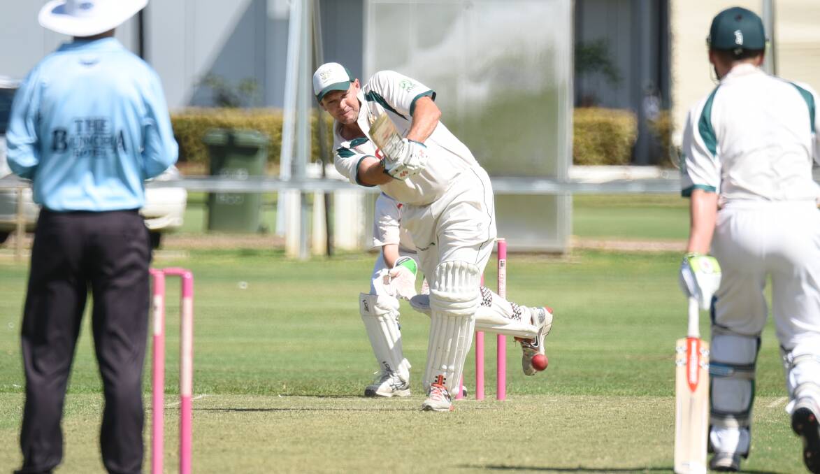 SHOT: Ben Williams powers one to the leg side during his knock for CYMS White in Saturday's outstanding RSL-Kelly Cup third grade grand final against Rugby Red at No.3 Oval. Photo: BELINDA SOOLE