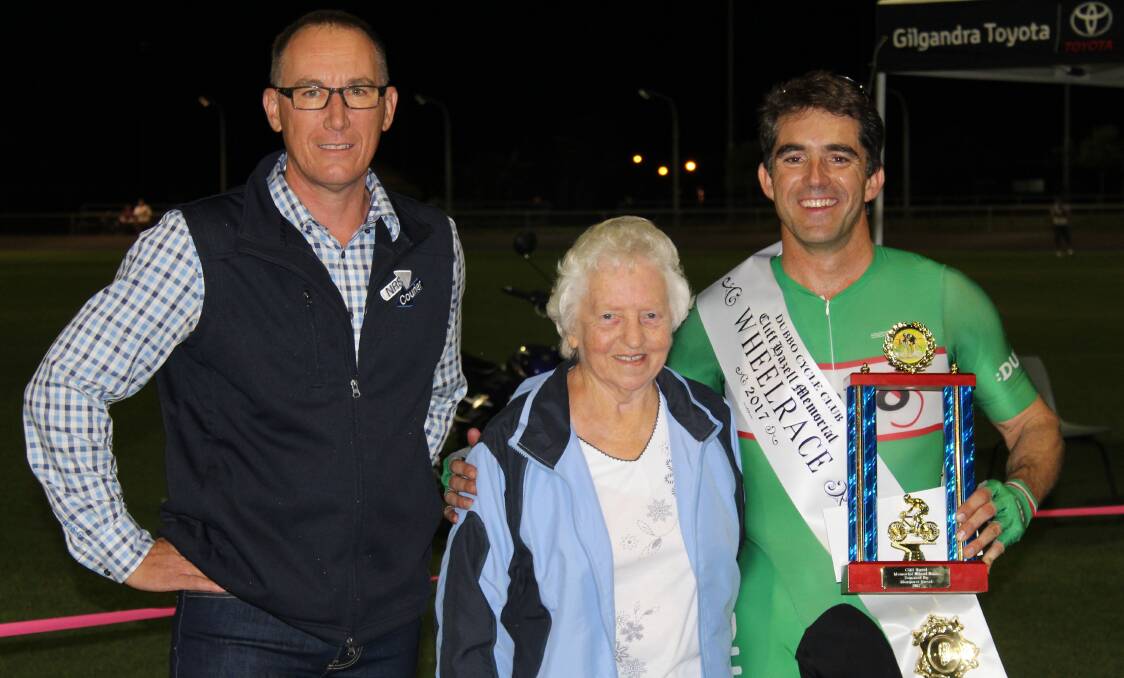 CONTENDER: Jason Farr, pictured with Stephen Hazell and Margaret Hazell after winning last year's Cliff Hazell Wheelrace, will be back again.