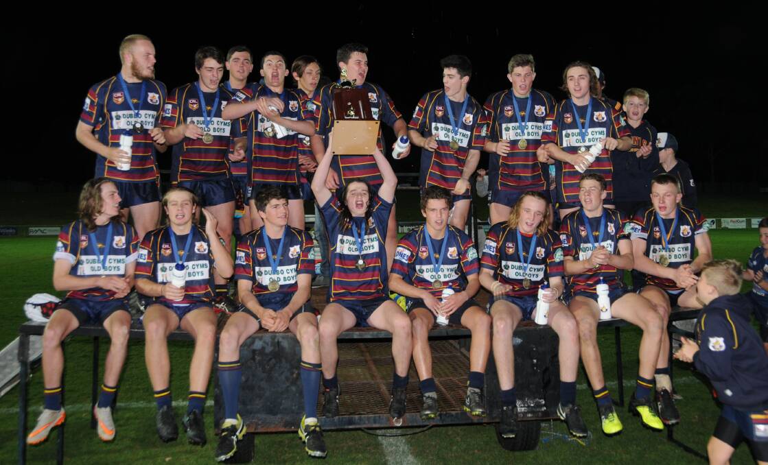 MIGHTY SAINTS: St John's under-16s players celebrate the grand final win over the Wellington Cobwoys on Saturday evening. Photo: NICK GUTHRIE