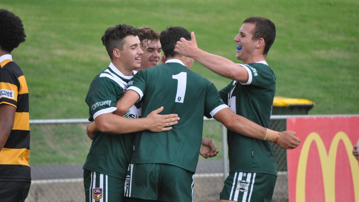 SUCCESS: The Western Rams under-18s celebrate a try during Saturday's semi-final drubbing of the Greater Northern Tigers. Photo: NICK MCGRATH
