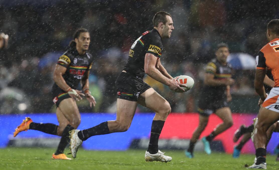 Isaah Yeo in action in the pouring rain at Carrington Park last year. File picture