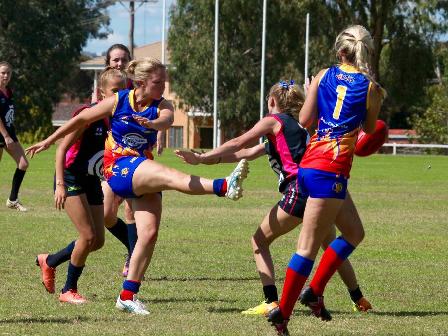 THICK OF THE ACTION: Emily Warner has made an immediate impact with Dubbo Demons and her fine play in midfield is one of the big reasons the side has dominated through the first two rounds. Photo: JO IVEY