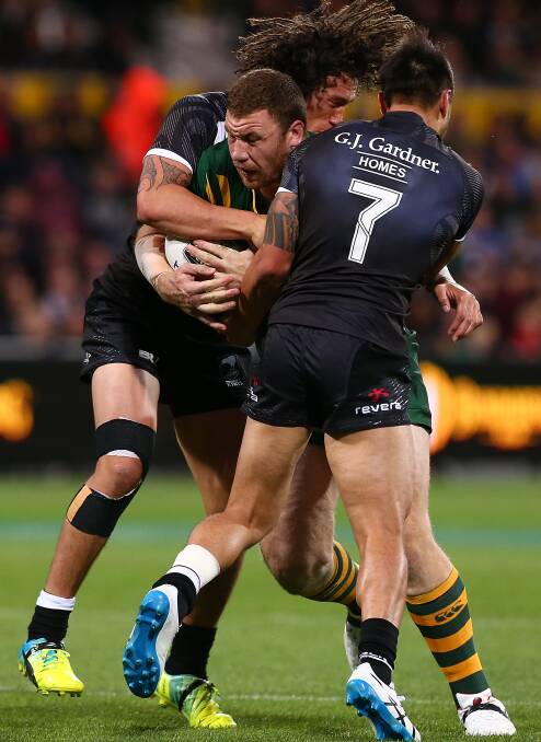 BIG BOPPER: Shannon Boyd smashes into the Kiwi defence during his debut.