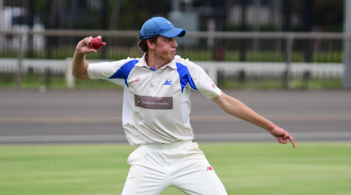 EFFORT: James Hughes took three wickets for Macquarie on Saturday but there wasn't much joy for the Blues bowlers. Photo: BELINDA SOOLE