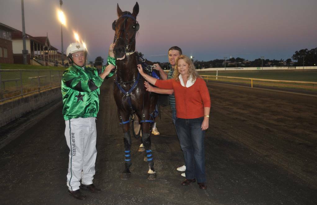 LOOK WHO'S BACK: Max Is Back, pictured after a win at Parkes in the past with David Harris Jnr, owner Belinda Harris and Scott Cusack, will be in action at Dubbo on Sunday.