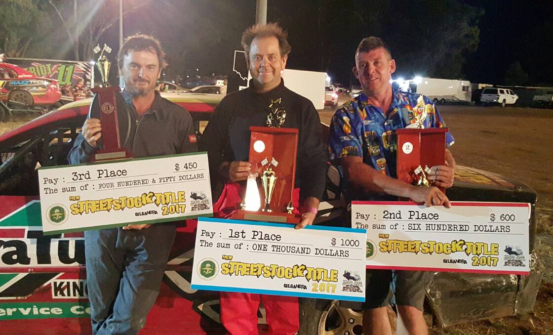 TOP THREE: Third-placed Andrew Norton, winner Peter Thompson and runner-up Glenn Mitchell at Gilgandra on Saturday night. Photo: CONTRIBUTED