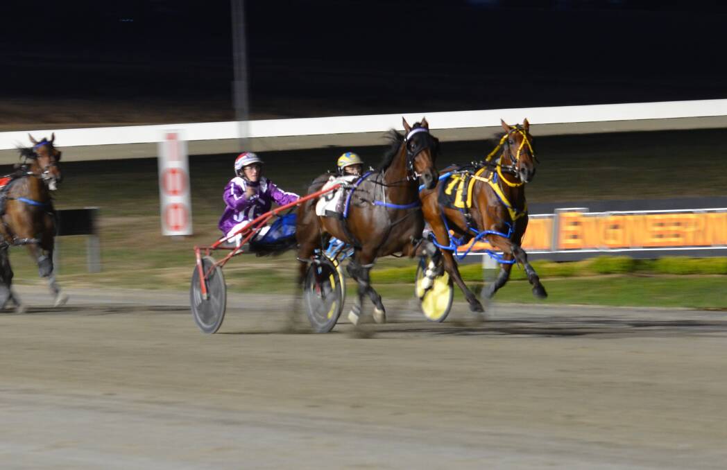 COMING THROUGH: Amanda Turnbull charges into the lead with her filly Now Eye See  in the second Gold Tiara heat. Photo: ANYA WHITELAW