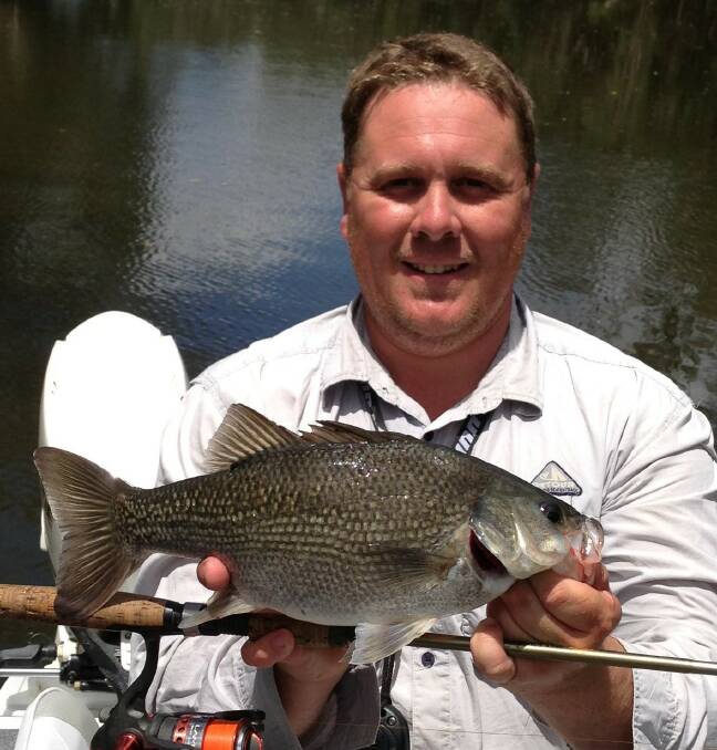 With Murray cod being given three months off to breed, Australian bass, yellowbelly and redfin are now the chosen target species. Pictured Matt Hansen with an Australian bass. 