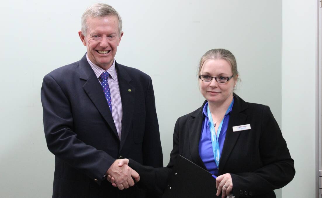 Federal Member for Parkes, Mark Coulton, with AEC’s Divisional Returning Officer Erin Eames.