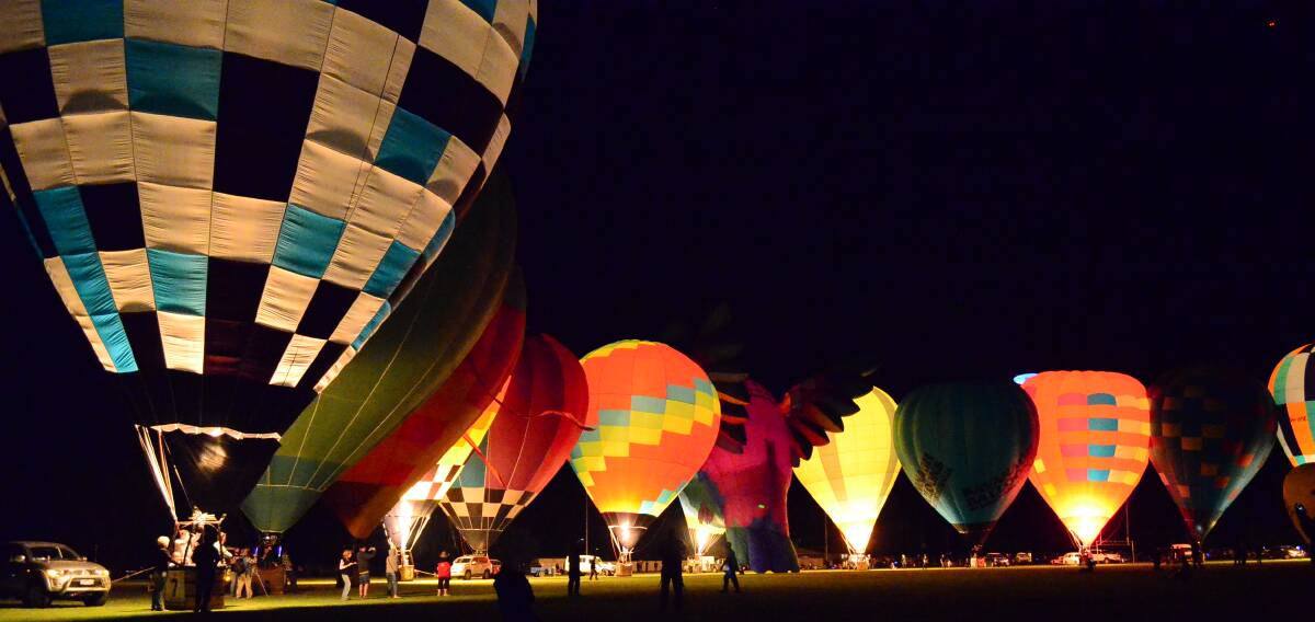 Glowing success: Around 10,000 people attended the Canowindra balloon glow spectacular and night markets.