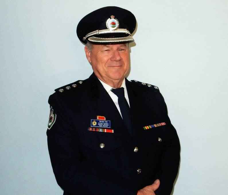 Honours: Gordon Hill has been recognised for 22 years as a critical incident support service peer with the Rural Fire Service, and later the State Emergency Service. Photo: CONTRIBUTED