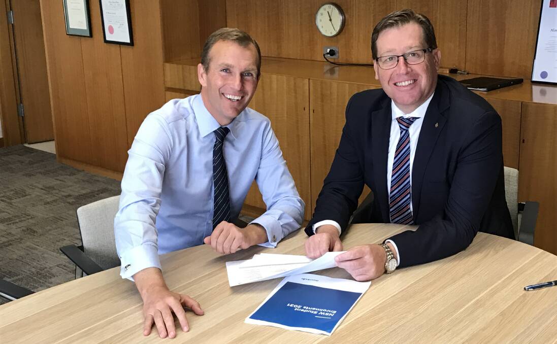 Big win: Education Minister Rob Stokes has given Dubbo MP Troy Grant good news in the NSW budget. Photo: CONTRIBUTED