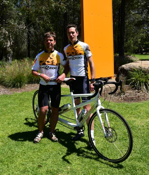 Challenging trip: Toby Sullivan and Ben Myers after completing the Zoo2Zoo ride at Taronga Western Plains Zoo on Sunday. Photo: PAIGE WILLIAMS
