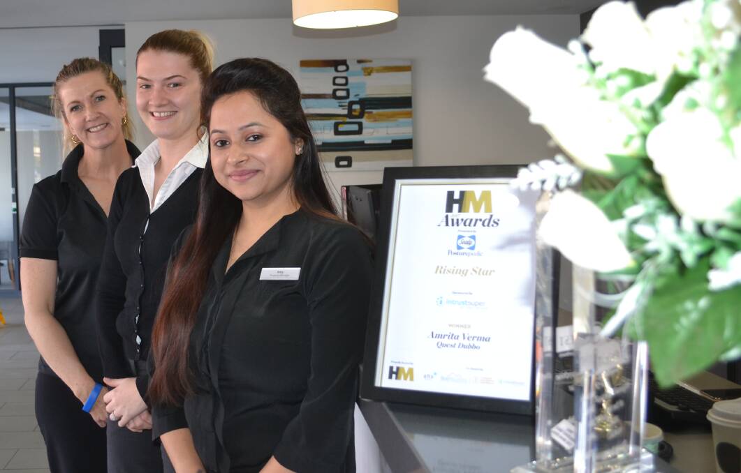 Recognised: HM Awards Rising Star winner Amy Verma (front) said she couldn't have won without the help of Quest staff including Leonnie McGrath and Bec Triplett. 