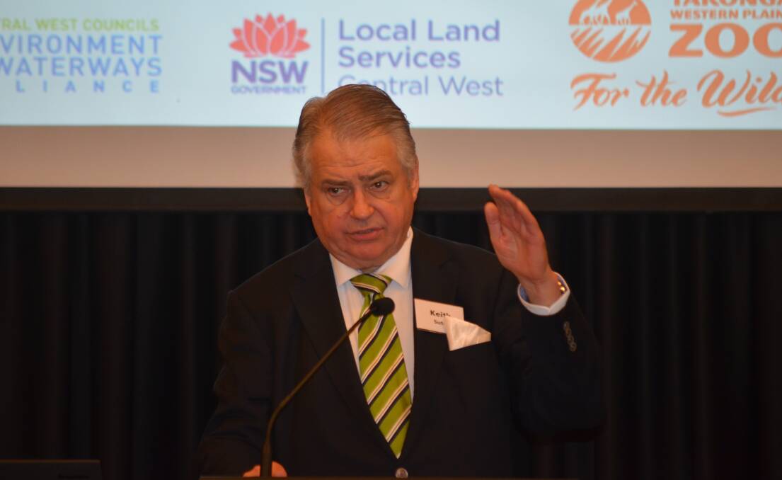 Dr Keith Suter addresses the crowd at the Hollows for Habitat forum. Photo: Mark Rayner