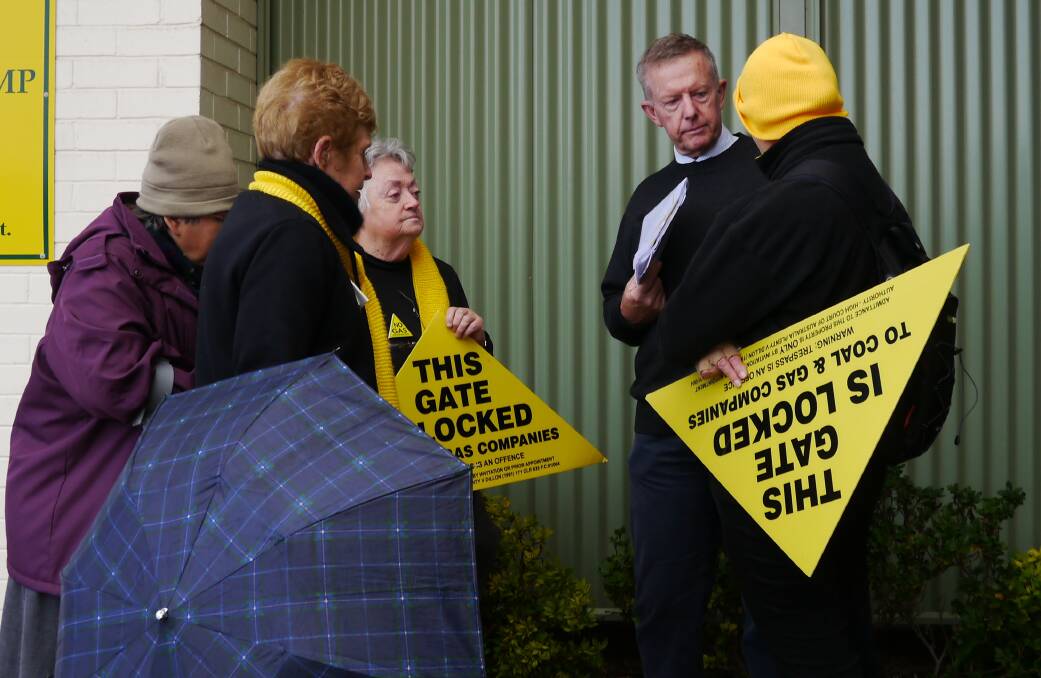 TACKLING THE ISSUE: Members of Dubbo Knitting Nannas Against Gas discuss coal seam gas with Mr Coulton during a meeting on Wednesday. Photo: CONTRIBUTED