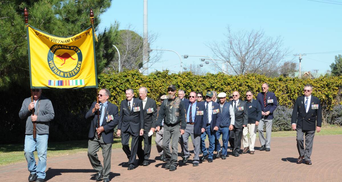 Time for Remembrance: Veterans march to the Vietnam War memorial in Victoria Park under the instruction of RSL Sub-Branch president Tom Gray. Photo: MARK RAYNER