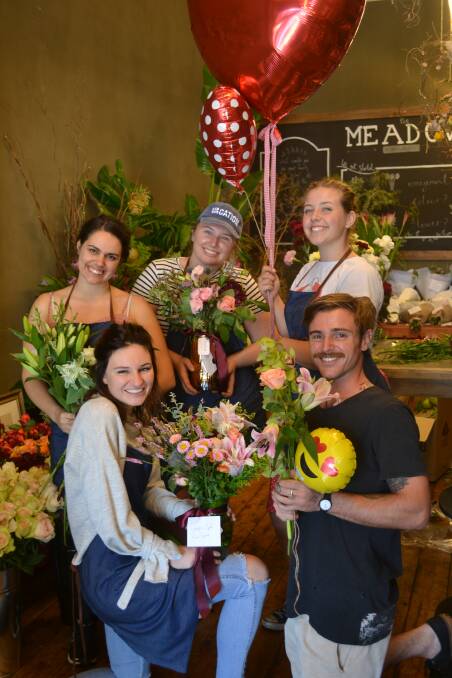 The Meadow owner Irissa Knight and staff Steph Allen, Belle Randell, Sally Kay and Ben Cluff with some of the orders they were preparing on Tuesday.