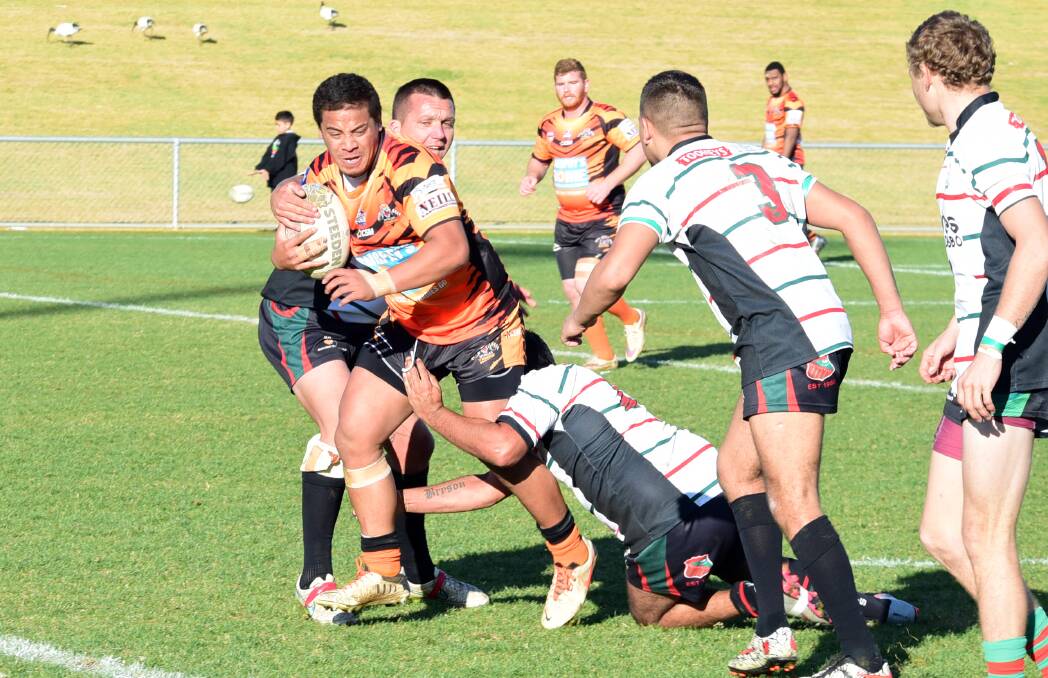 Too Strong: Nyngan Tigers lock Loma Atuau storms through the Westside defence during an impressive performance at Caltex Park on Sunday. Photo: Brook Kellehear-Smith