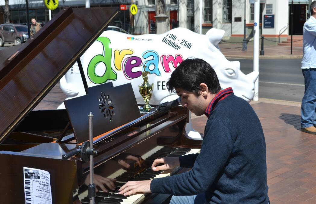 Musically-minded: Kyall Flakelar shows his talent at a preview to Pianos on the Pavement on Thursday. Photo: MARK RAYNER