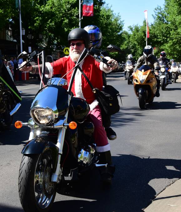 Ride on: Members of the Dubbo and Western Plains Ulysses Branch on their annual toy run in December. They raised $1800 for two community organisations. Photo: PAIGE WILLIAMS