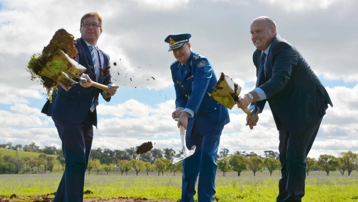 Dubbo MP and Deputy Premier Troy Grant, Corrective Services Commissioner Peter Severin and corrections minister David Elliott turn the first sod for a new rapid-build at Wellington Correctional Centre in August. Photo: FAYE WHEELER