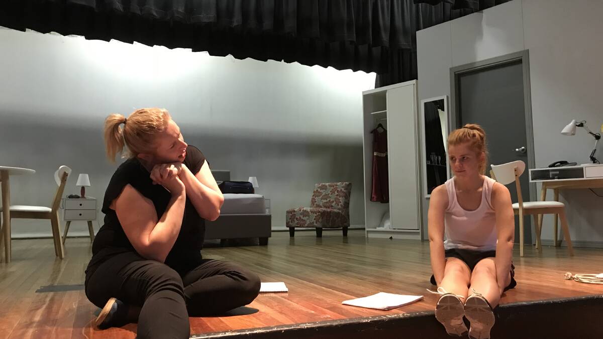 Break a leg: Erifili Davis and Erin Walsh in rehearsal for Secret Bridesmaids' Business. Tickets are still available for the show on Saturday night. Photo contributed.