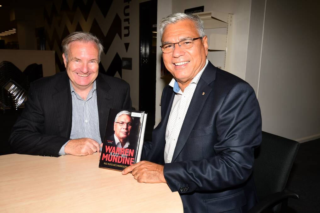 In his words: Macquarie Regional Library manager John Bayliss and indigenous leader Warren Mundine at the launch. Photo: BELINDA SOOLE