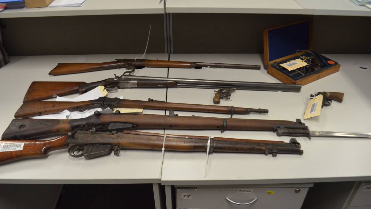 A Lithgow made Lee Enfield, an army cadet rifle and percussion cap pistol are among the more unusual guns handed in to Orange police. At Dubbo 10 guns have been handed in so far. Photo: DECLAN RURENGA