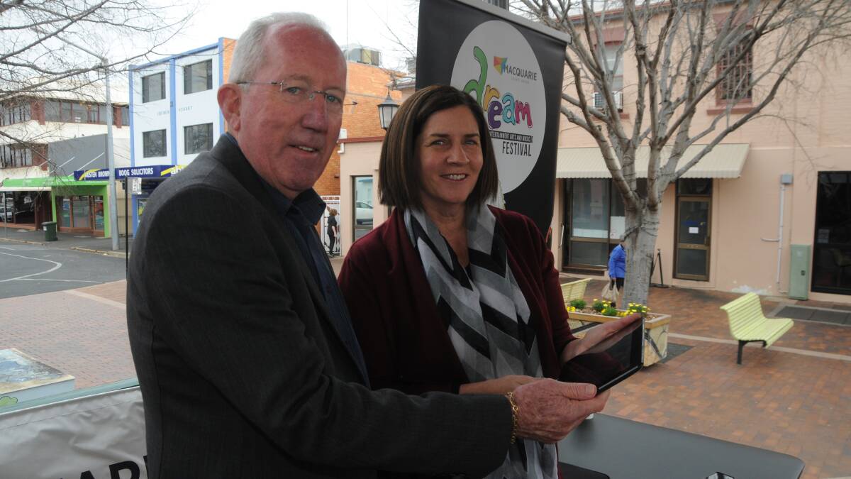 Countdown: Dubbo Regional Council administrator Michael Kneipp and DREAM Festival committee chairwoman Anne Field check out the festival's new website ahead of the events in October. Photo: FAYE WHEELER