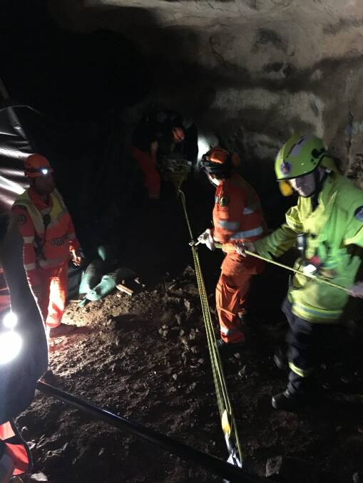 Emergency responders perform their duties during a training exercise at the Wellington Caves. 