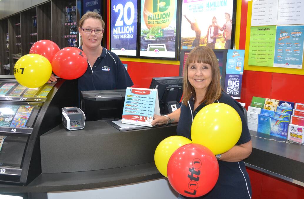 A million reasons to smile: News at the Mall sales assistants Vanessa Duce and Toni Agnew celebrate the sale of a winning $1.43 million Lotto ticket from the newsagency. Photo: FAYE WHEELER