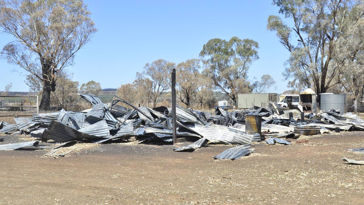 Long recovery: Wreckage of property hit by the Sir Ivan fire. Legal Aid NSW is offering services to the region. Photo: BELINDA SOOLE