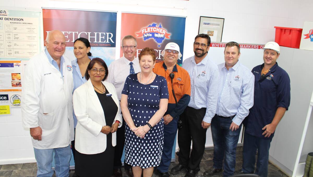 Training boost: (Back row) Fletcher International director Roger Fletcher, Fletcher International CEO Melissa Fletcher, Parkes MP Mark Coulton, Fletcher International employees Lester Daley, Michael Cooper, Deon Allen and Jason Herbert and (front row) the Department of Prime Minister and Cabinet’s Gargi Ganguly and Chris Scales. Photo contributed.