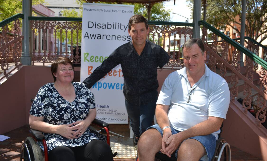 Western NSW Local Health District disability advisory committee chairwoman Meg Jones and committee consumer representative Ross Mason (left) with Disability Inclusion Plan ambassador Ben Austin OAM at the launch. Photo: FAYE WHEELER