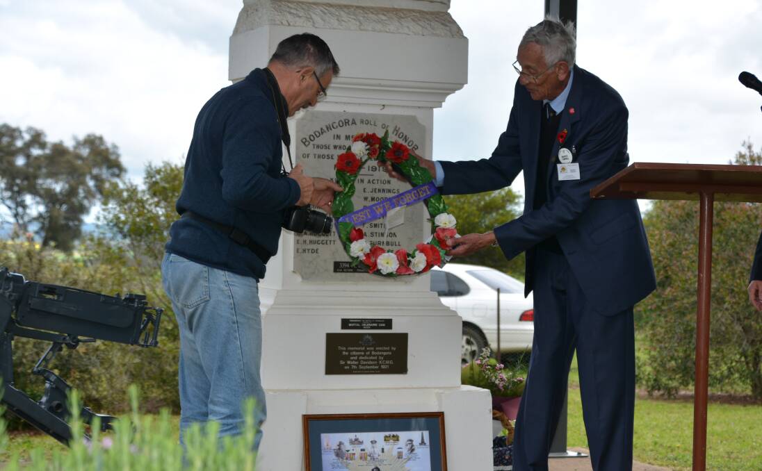 Remembrance: Martial Delebarre OAM and service organiser Maurice Campbell lay a wreath at the Fromelles Memorial Service held at Bodangora, 100 years after the battle. Photo: FAYE WHEELER