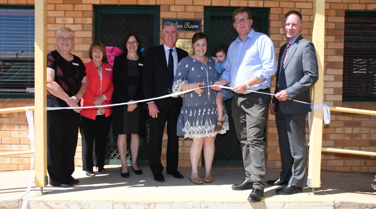 Official opening: Debrah Davis and Julie Cooper from Western NSW Local Health District, Tresillian operational manager for regional services Debbie Stockton, Tresillian CEO Robert Mills, Dubbo mum Simone O'Neill and daughter Milla, Dubbo MP Troy Grant, and Western NSW Local Health District chief executive Scott McLachlan. Photo: BELINDA SOOLE