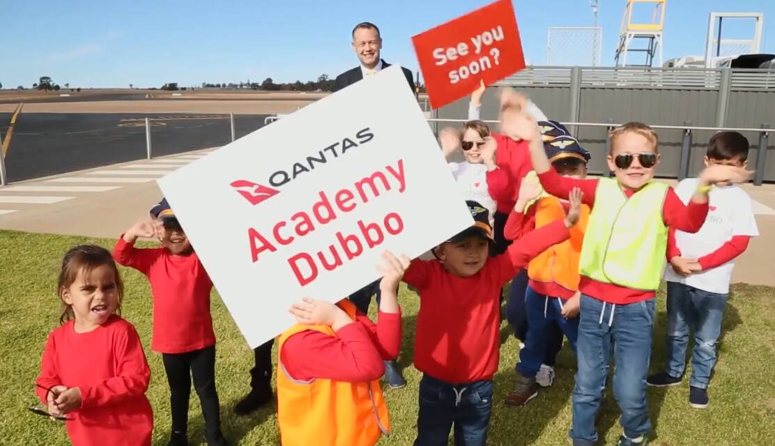 Dubbo mayor Ben Shields and children in a video posted to social media earlier this year to promote the city’s case to host the pilot academy. Photo: FACEBOOK
