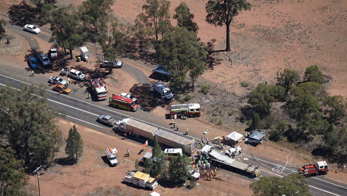 TRAGEDY: Emergency service crews at the scene of Tuesday's fatal accident near Dubbo. Photo: BRADLEY GUEST