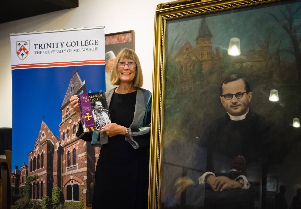 Nola Firth with her book 'The Armour of Light: The Life of Reverend Doctor Barry Marshall' at its Melbourne launch. The book was launched in Dubbo this month: Photo: MATT PHAN
