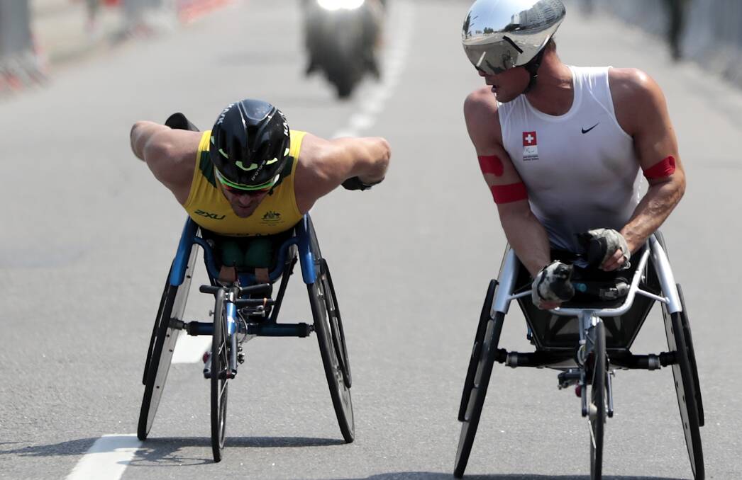 Down but never out: Kurt Fearnley was beaten by Swiss ace Marcel Hug by just one second in the men's T54 marathon. Photo: GETTY IMAGES
